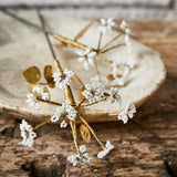 FLEUR EN LAITON ET PERLES